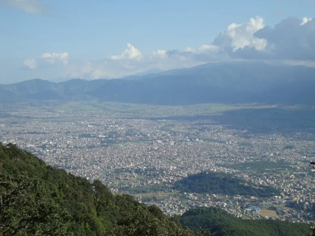 Kathmandu Valley view from Shivapuri Nagarjun National Park with forest hills and city landscape