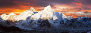 Panoramic view of Mount Everest and the surrounding Himalayan peaks at sunrise, illustrating the extreme terrain where Everest body recovery missions take place.